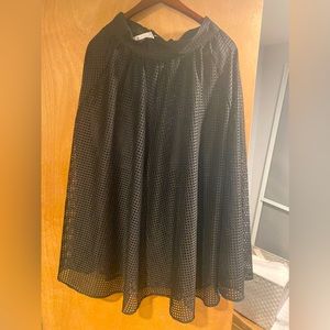 Black midi skirt with small textured holes